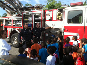 Training in the public at a fire truck demonstration